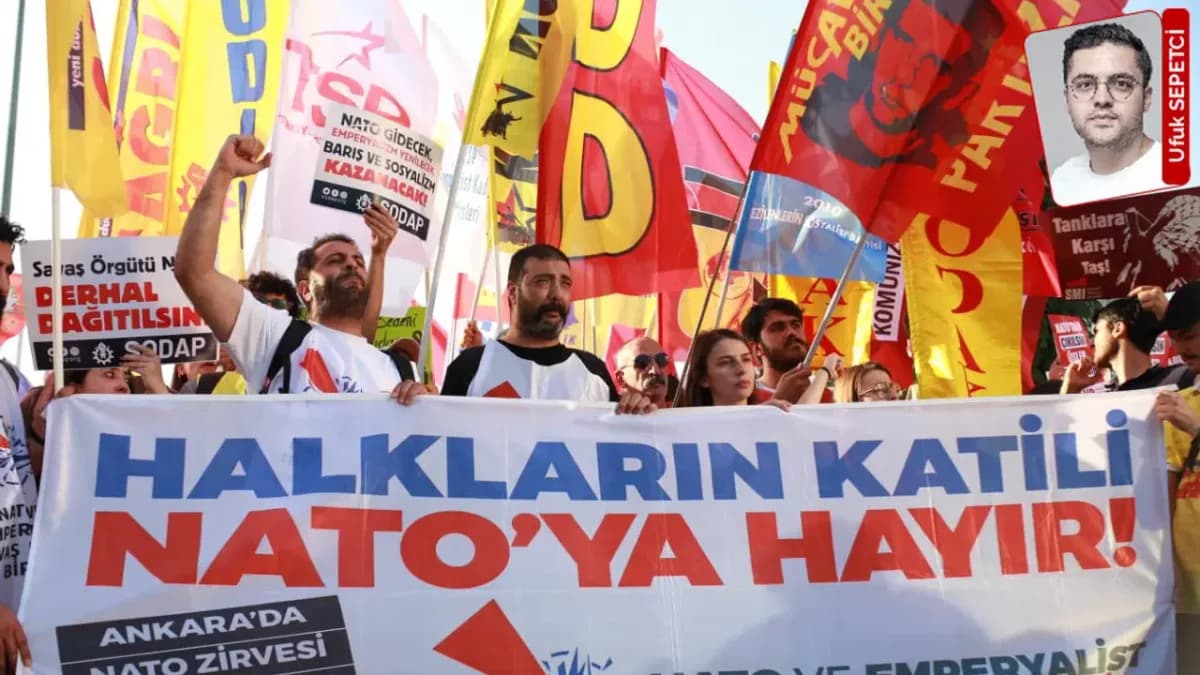 İstanbul'da NATO Zirvesi'ni protesto eden grup, AKM önünden Dolmabahçe'ye yürürken "Halkların katili NATO'ya hayır" yazılı pankart taşıdı.